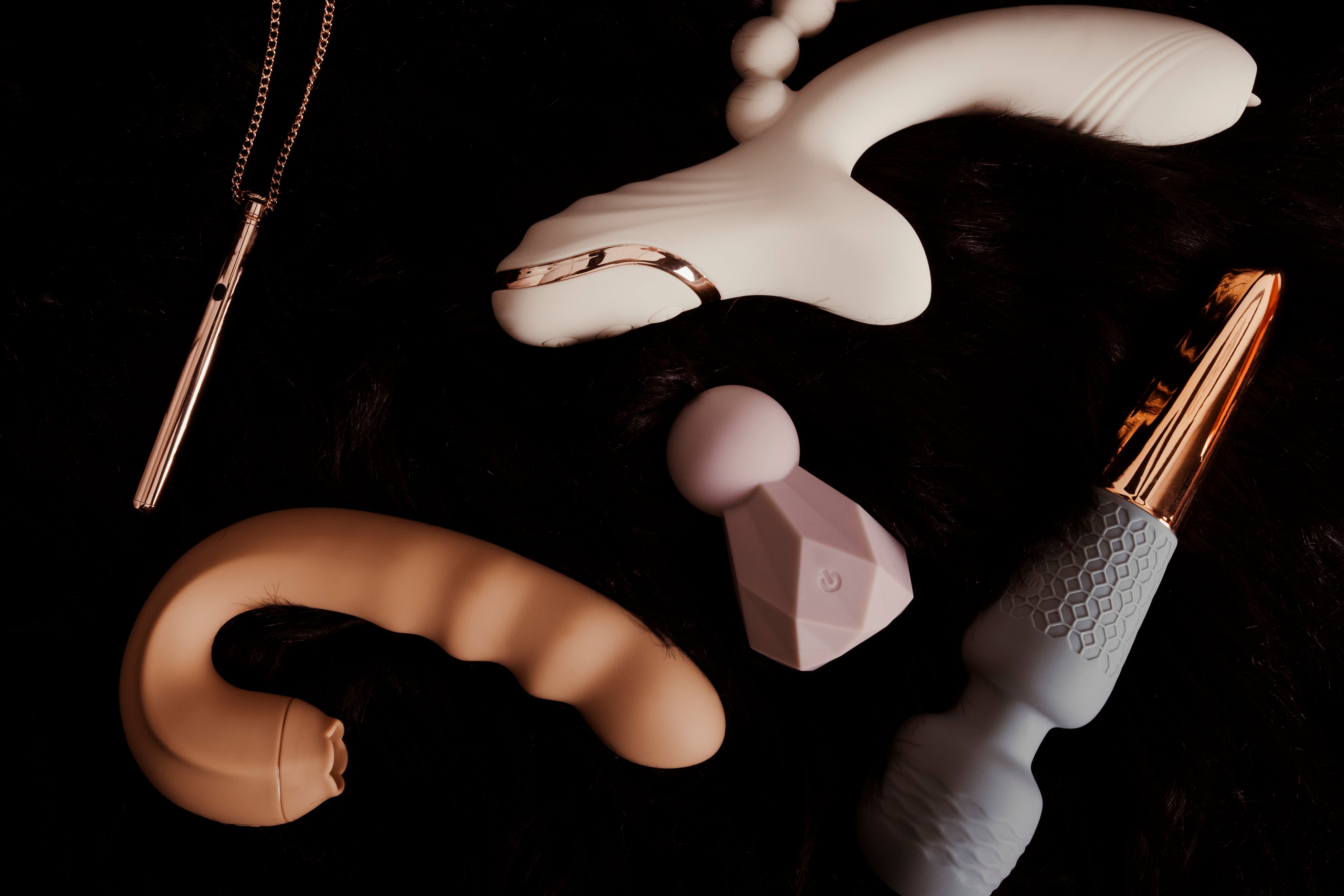 Discover premium wellness massagers in soft beige tones, crafted from smooth silicone with elegant design and gold details for ultimate relaxation.